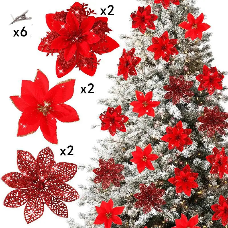 A collection of six red glittered artificial Christmas flowers with clips displayed against a snowy evergreen tree.