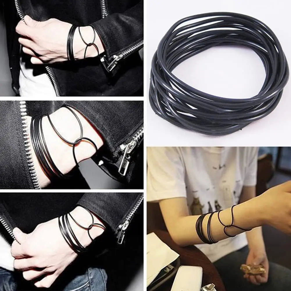 A collection of ten black silicone bracelets with gold accents are shown on wrists and in a coiled arrangement.