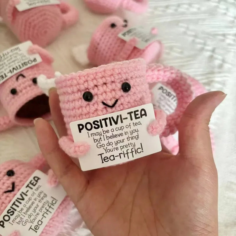 Handmade crochet tea cup ornament in pink with a motivational message