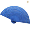 Blue hand carved bamboo folding fan shown in a fan shape.