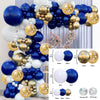 A collection of navy, silver, and white balloons arranged in a garland arch with various sizes and colors.