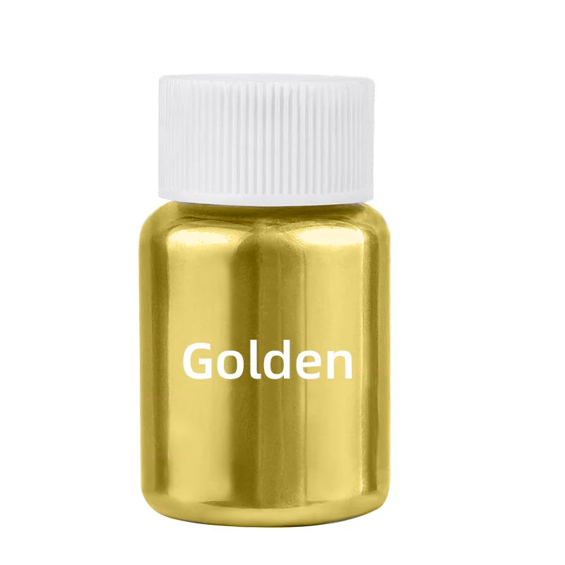 A small gold glass jar with a white cap labeled Golden, containing glitter dust for cakes and pastries.