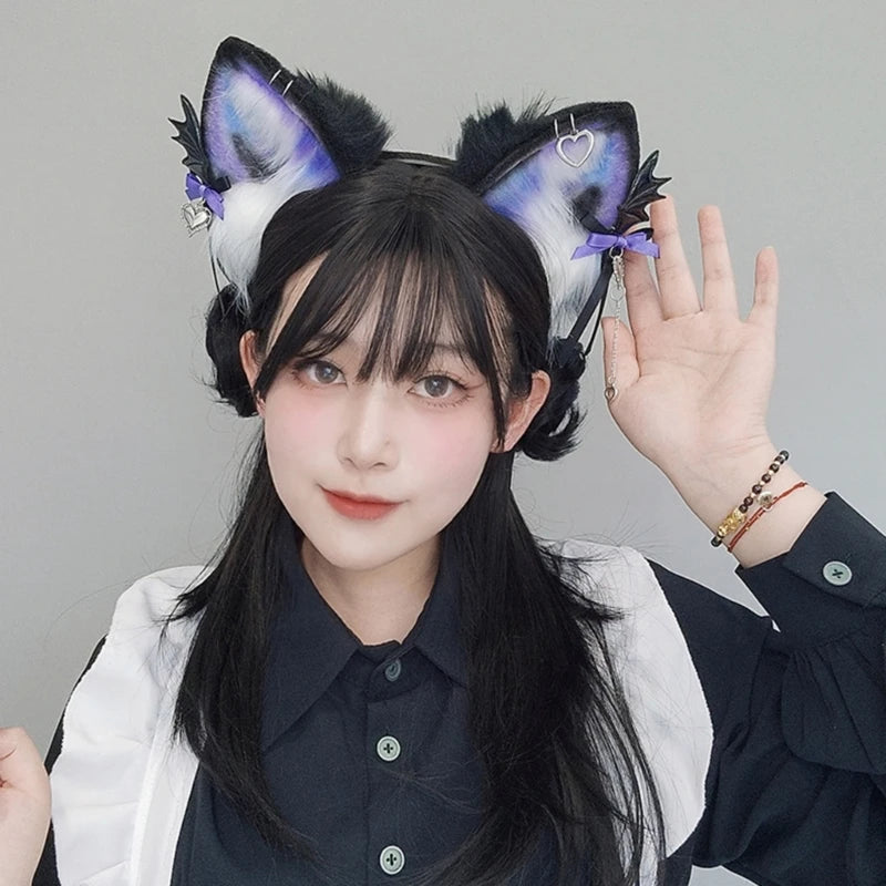 A young woman with long black hair is wearing a furry fox ears headband and a black shirt.