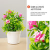 Artificial pink and white roses in a white pot for home decor simulation
