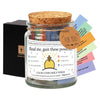 A glass jar filled with color-coded Bible verses and a cork lid, used for emotional guidance.