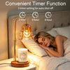 Elegant gold candle warmer lamp with a timer set for 2, 4, or 8 hours next to a sleeping woman in bed