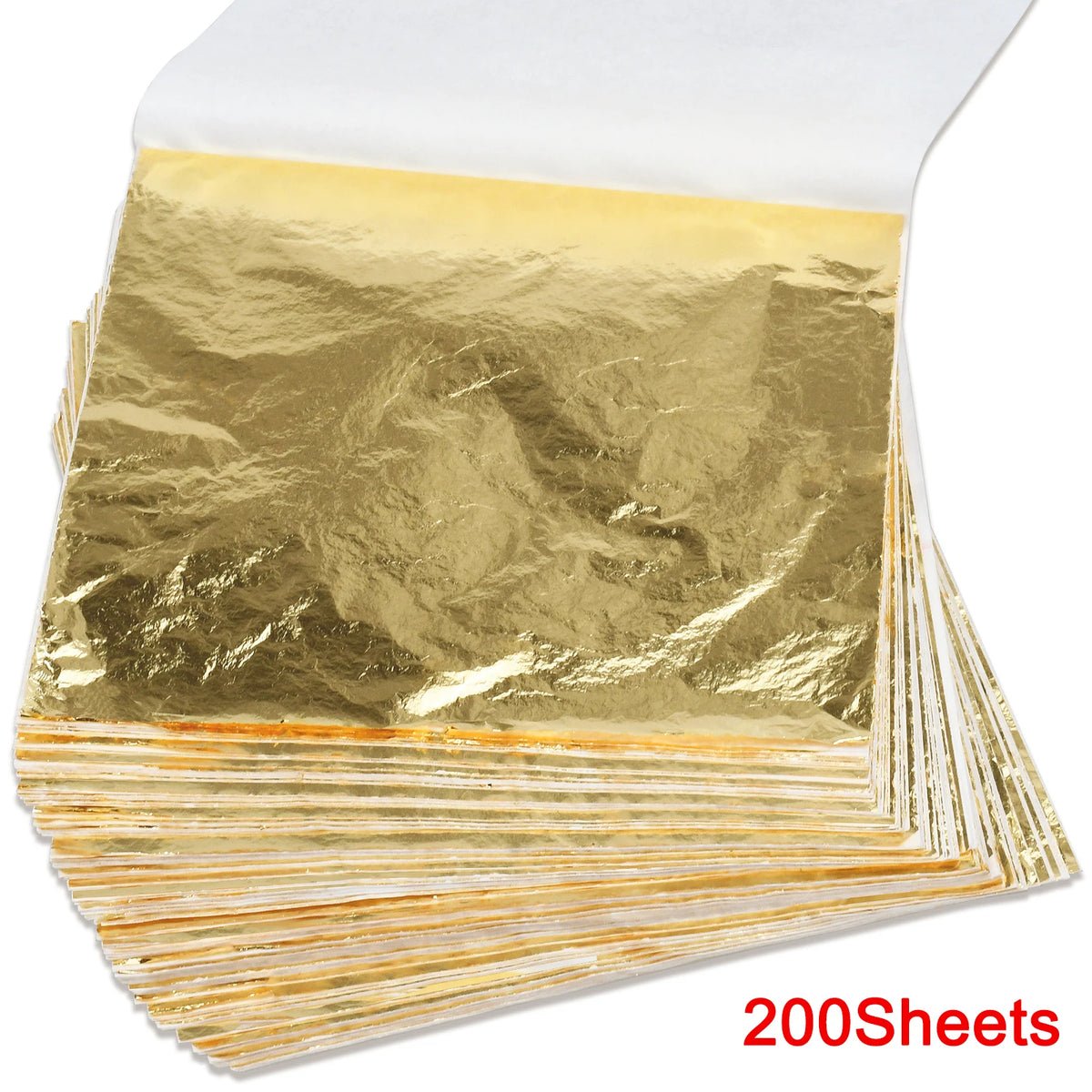 A stack of 200 imitation gold leaf sheets for gilding and crafting.