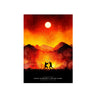 A dramatic canvas wall art depicting a fiery sunset with a bright sun and silhouetted figures against a mountain landscape.