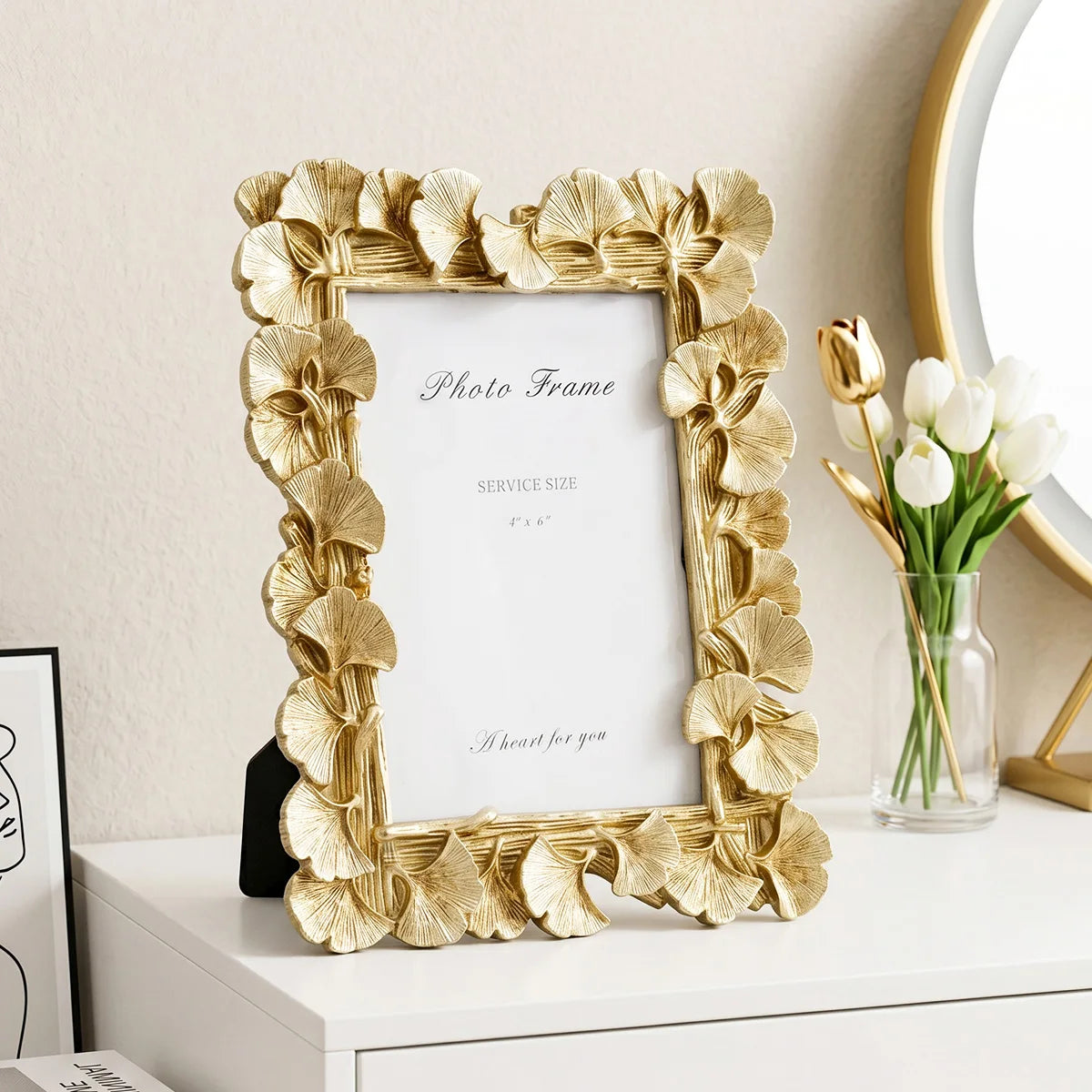 A gold leaf-textured picture frame with a white mat displaying the text Be heart for you