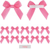 A set of pink satin ribbon bows with white adhesive backing for crafting and gift wrapping