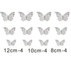 A set of four gold butterfly cake toppers in different sizes: 12cm, 10cm, and 8cm.