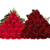 A large bouquet of deep red velvet artificial roses for weddings and home decor.