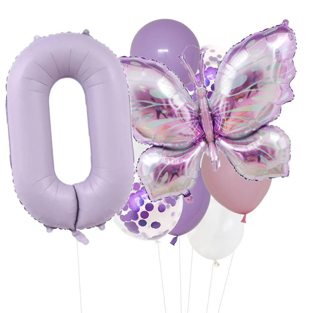 A set of purple butterfly foil balloons shaped like the number zero and various other balloon shapes.