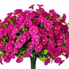 A vibrant bouquet of artificial morning glory flowers in bright pink and green eucalyptus stems.