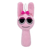 A pink collectible plush toy with long ears and a bow.