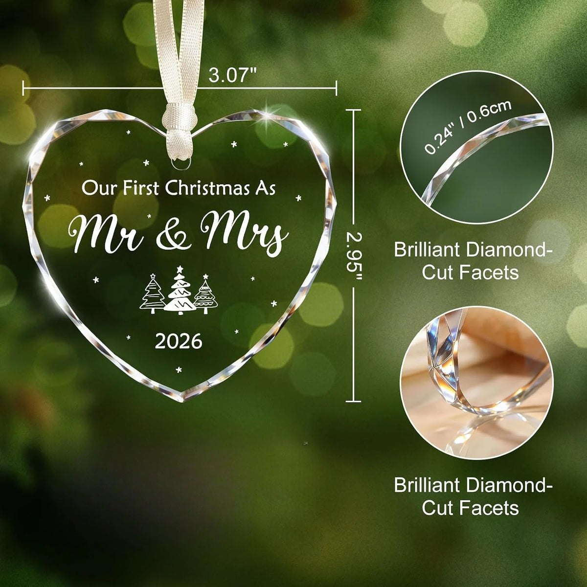 A clear heart-shaped crystal ornament with a silver ribbon, engraved with Our First Christmas As Mr & Mrs 2026.