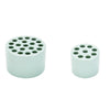 A pair of light mint green spiral stem holders for DIY floral arrangements.