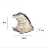 Handmade resin crocodile tea pet ornament with dimensions 4cm high and 5.2cm long.