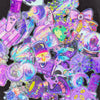 A colorful pack of laser cute magic witch graffiti stickers featuring various purple, pink, and neon designs.