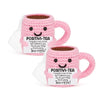 Pink crocheted tea cup ornament with a smiling face and motivational text