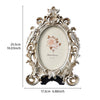 Vintage gold oval resin picture frame with floral detailing and distressed finish