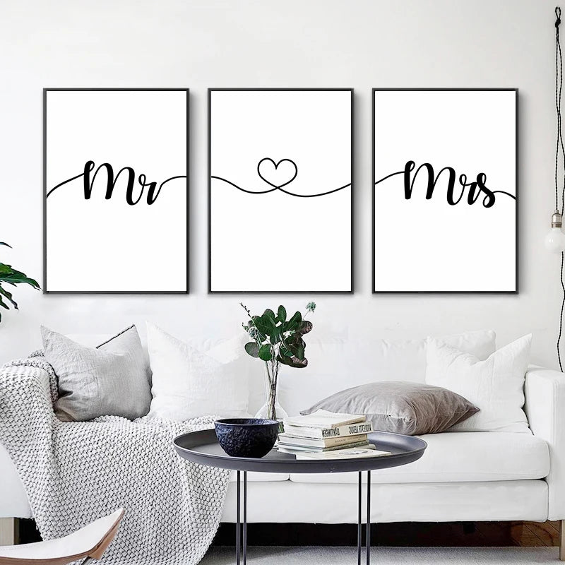 Three framed minimalist line art prints featuring the words Mr, a heart, and Mrs on white backgrounds