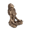 A bronze statue of a female figure with long flowing hair looking upwards, representing Mother Earth Gaia.