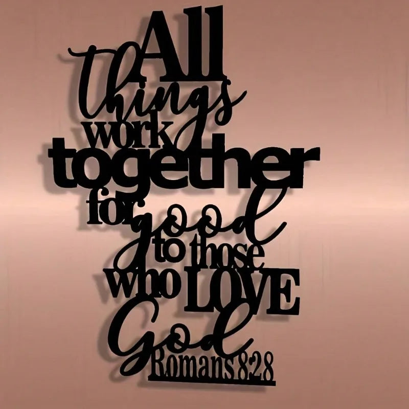 Black script text on a light background featuring the Bible verse Romans 8:28