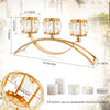 A gold crystal candelabra with three arms designed to hold tea candles.