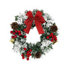 A 10-inch artificial Christmas wreath decorated with evergreen branches, red berries, and a large red velvet bow.