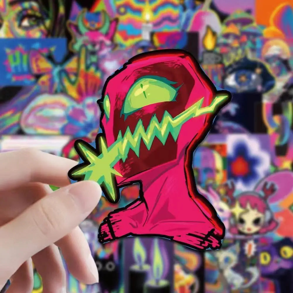 A hand holds up a pink and green stylized monster sticker from the Trippy Vaporwave Sticker Pack