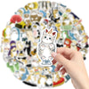A hand is holding an adorable cartoon cat sticker pack featuring various cute cats and animals.