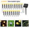 A set of 20/30LED solar bubble lights with black wires and solar panels shown in various outdoor settings.