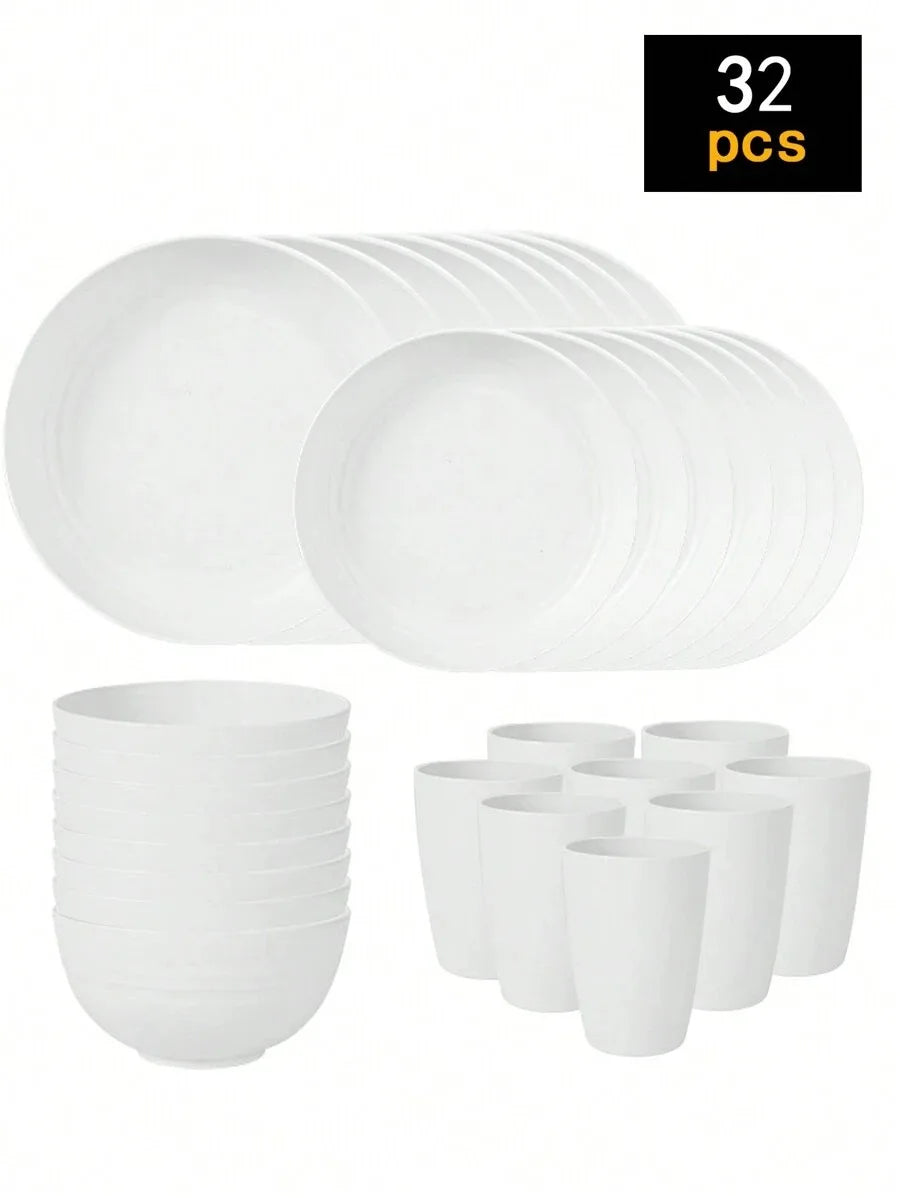 A set of 32 white reusable plastic tableware items including plates and cups.