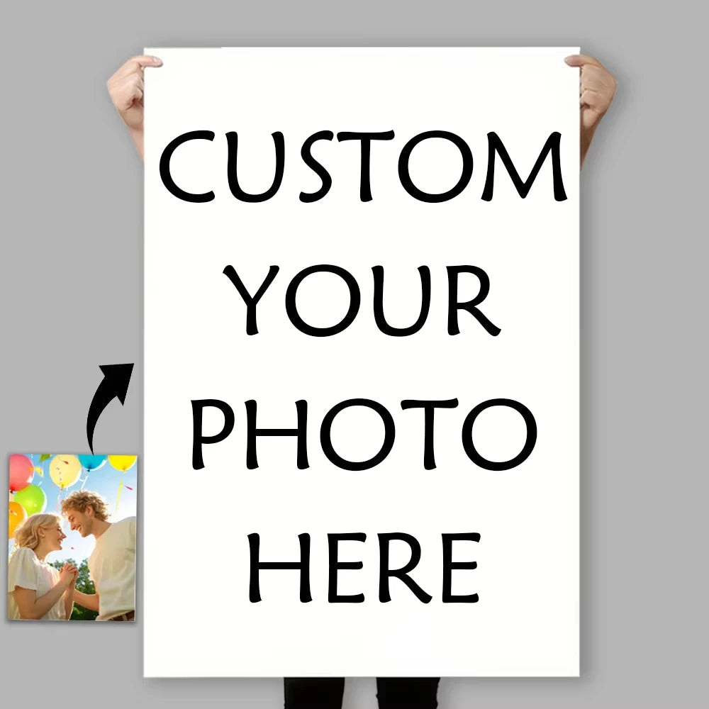 A white sign with black text that reads Custom Your Photo Here, held up by a person.