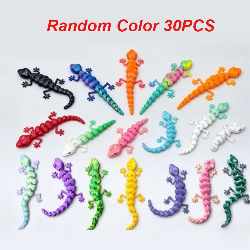A collection of 30 random color 3D printed articulated gecko desk toys.