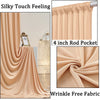 Soft peach colored silky touch fabric backdrop curtains with a rod pocket and wrinkle-free finish