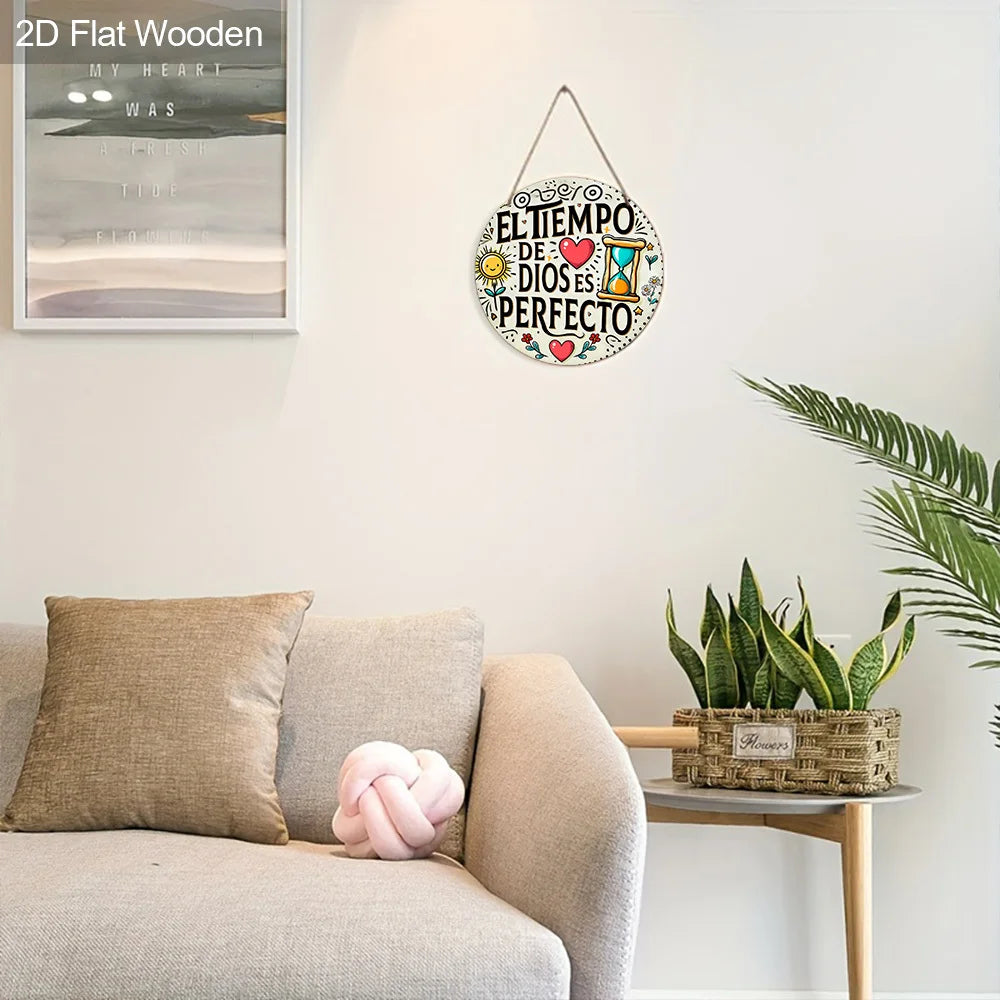 A round wooden wall plaque featuring the Spanish quote El tiempo de Dios es perfecto, displayed on a white wall.