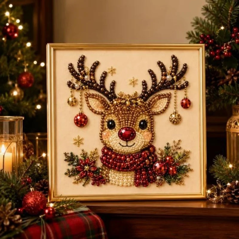 A framed piece of pearl and diamond painting featuring a deer head with antlers and festive greenery.