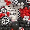 A balloon garland arch featuring checker tire balloons in red, black, and white colors.