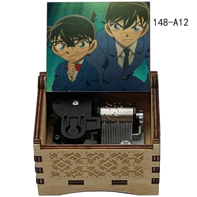 A wooden music box featuring an anime character design, likely from Detective Conan, with a metal mechanism inside.