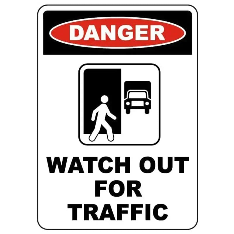 A vintage red and black warning sign indicating danger and caution for traffic.