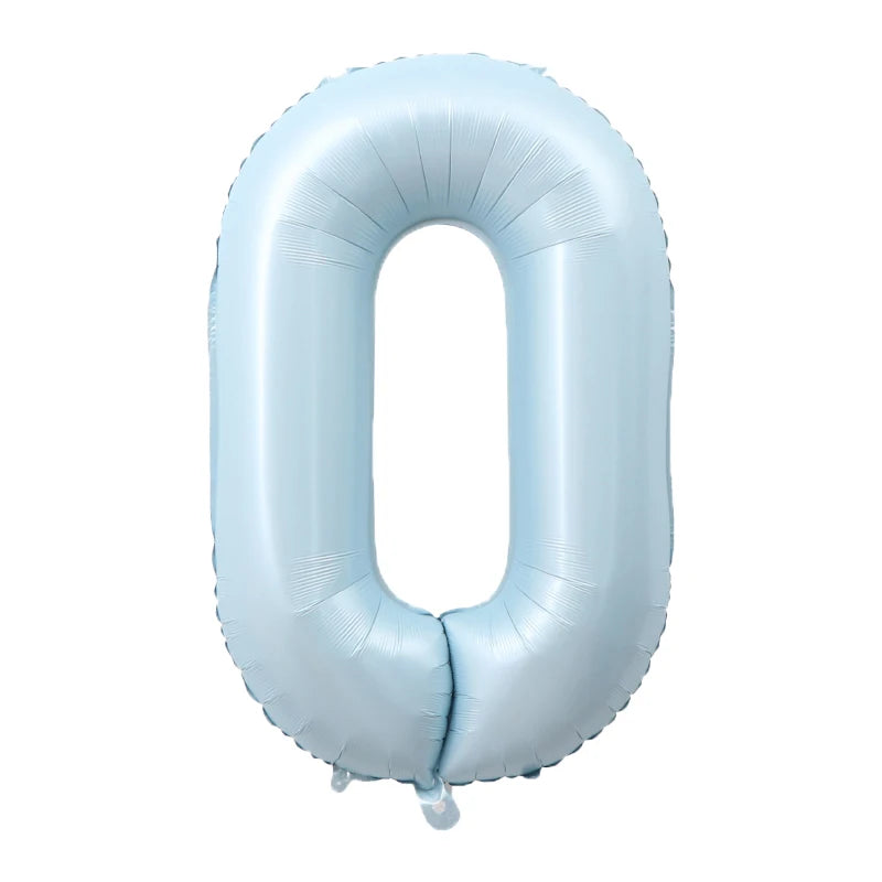A light blue foil number balloon shaped like the digit zero.