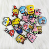 A collection of colorful SpongeBob SquarePants character shoe charms on a white background.