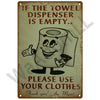 Vintage metal sign featuring a cartoon character encouraging the use of clothes instead of a towel dispenser.
