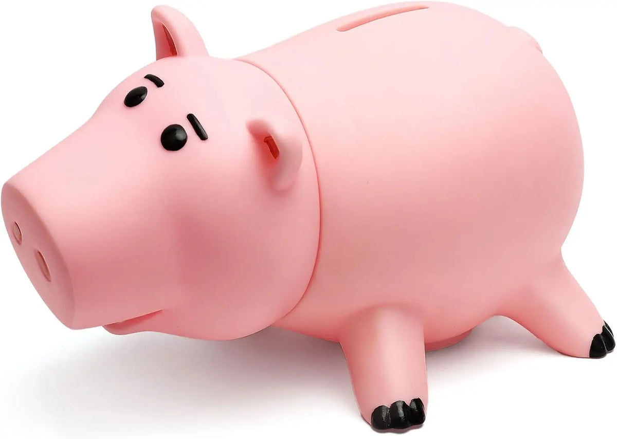A pink cartoon piggy bank with black features is shown from a side angle.