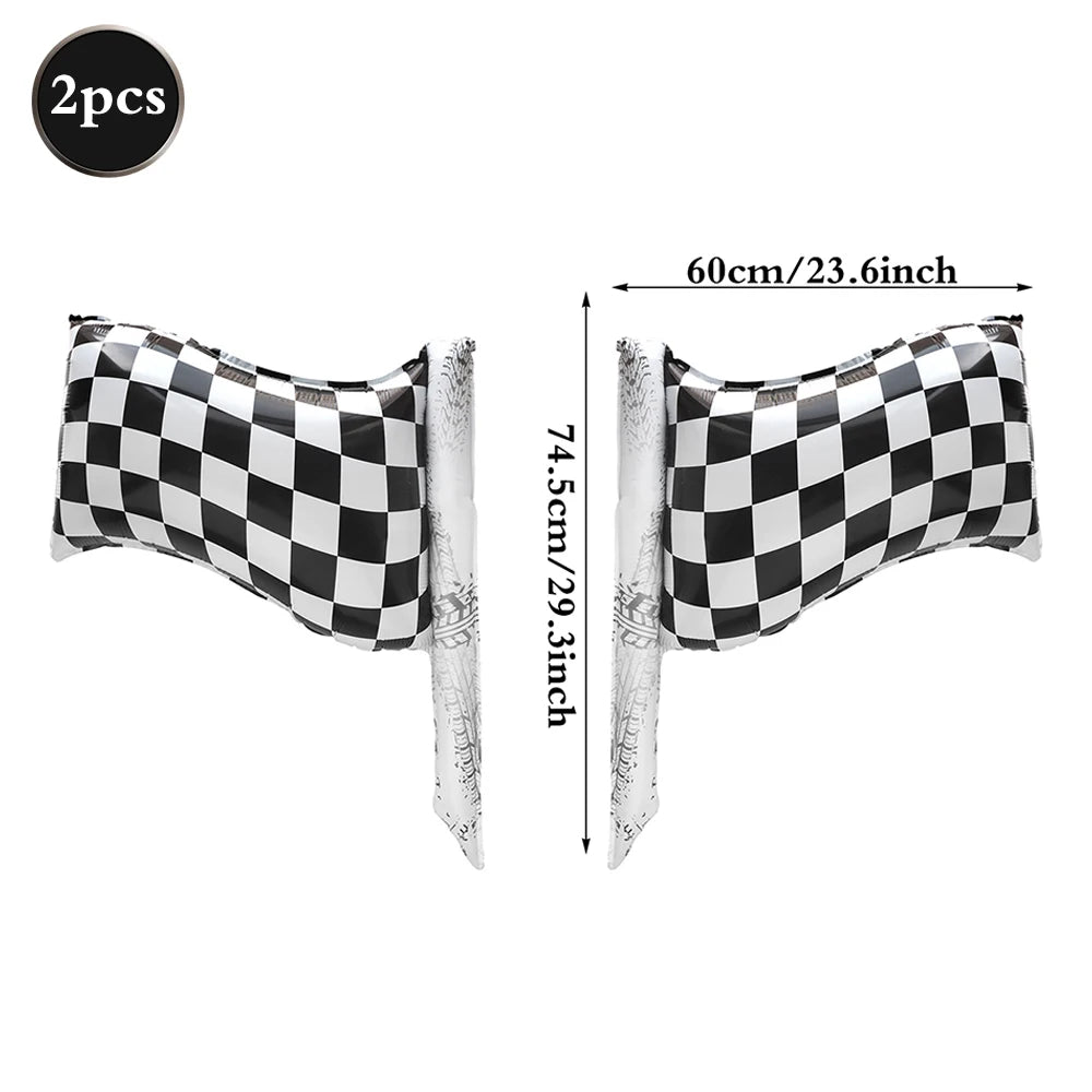 A pair of checkered flag shaped balloons used as a race car traffic light decoration.