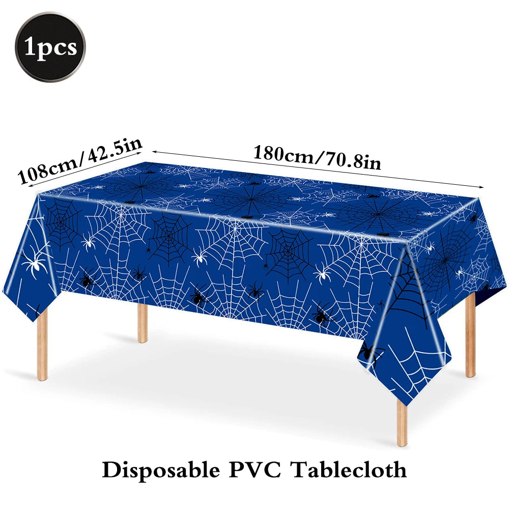 Blue disposable PVC tablecloth featuring a white spider web pattern for parties