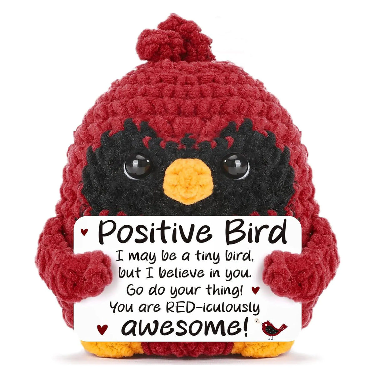 Handmade crochet bird figurine with a red body and black markings, featuring an inspirational card.