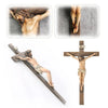 A hand-painted resin cross statue depicting the crucifixion of Jesus Christ.